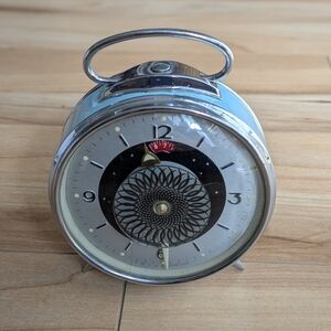 Vintage Alarm Clock Animated sun flower, hypnosis -Shanghai Wind Up Mechanical